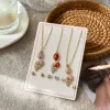 Golden tulip-shaped necklace stud set, purple-red and pink main pendant with card accessory gift details Picture